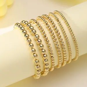 7er Set minimalistische, 18K vergoldete Perlen-Stretcharmbänder mit glattem Metall-Finish