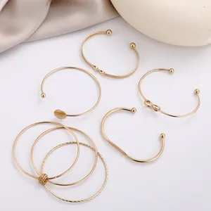 8-piece set of gold minimalist chain bracelets and geometric open bangles for women