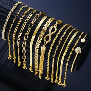 Detailed view of 14-piece gold chain bracelet set with infinity and heart symbols