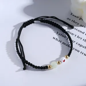 Ρυθμιζόμενο μαύρο πλεκτό βραχιόλι με φωτεινή χάντρα καρδιά και λεπτομέρεια από πέτρα