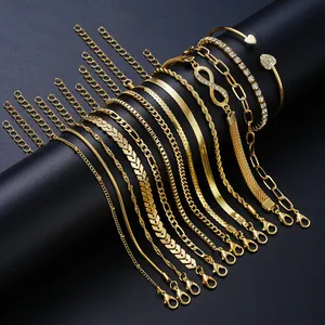 14-piece gold chain bracelet set with infinity symbol and rhinestone accents on black display