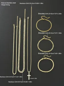 Detail view of gold stainless steel necklace set with various chain styles and cross pendant