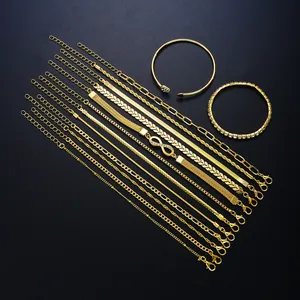 Detail of 14pcs gold-plated chain bracelet set with infinity and heart motifs