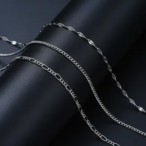 Three-piece silver chain set featuring classic curb, figaro, and oval sequin metal links