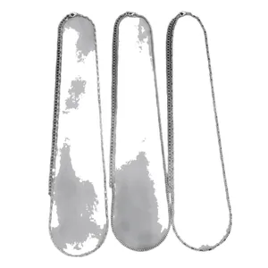 Three-piece minimalist silver chain necklaces set including snake and figaro styles