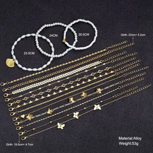 Mehrlagiges Fußkettchen-Set mit Schmetterlingen, Herzen und weißen Perlen aus Goldlegierung