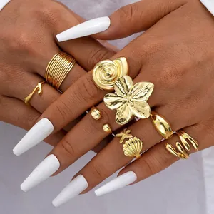 Collezione di Anelli Aperti Regolabili Stile Oceano Stella Marina Conchiglia Fiore per Donna Gioielli in Lega Dorata