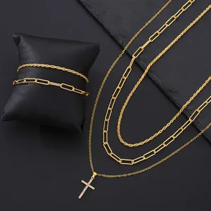 Conjunto de collares dorados con colgante de cruz brillante y cadena gruesa