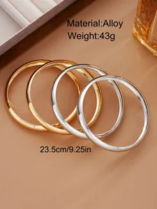 Close-up of alloy bangle set showing 23.5cm circumference and 43g weight details
