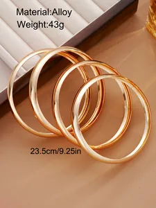 Detail of 4-piece gold alloy bracelet set showing 43g weight and 23.5cm circumference