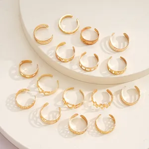 15-piece golden adjustable open ring set featuring hollow stars and heart designs