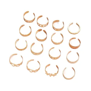 Set of 12 rose gold open toe rings featuring hollow star and heart designs