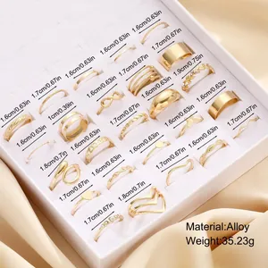 25-piece gold alloy ring set with moon star snake and geometric designs for women