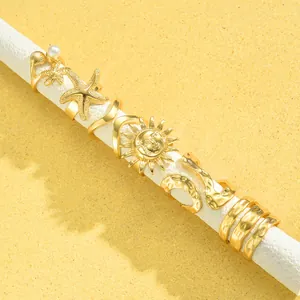 Böhmisches Ring-Set in Gold mit Seestern, Sonne, Perlen und Muscheln auf Koralle