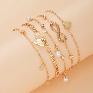 Fünfteiliges goldenes Boho-Fußkettchen-Set mit Schmetterling, Stern, Infinity und Perlen