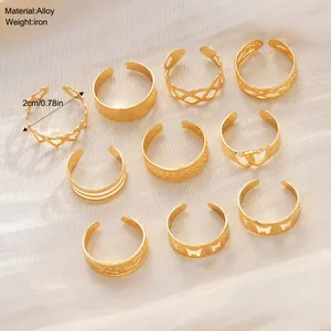 Set de 10 anillos ajustables para el dedo del pie en color dorado con diseño de corazón