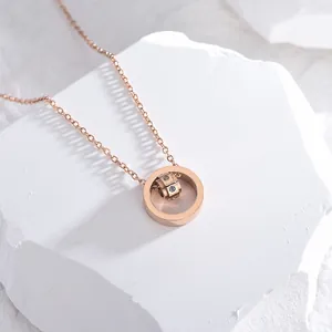 Rose gold minimalist square ring necklace with sparkling zircon wheel on stone
