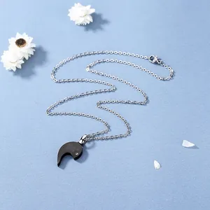 Collier couple en acier inoxydable avec pendentif cœur noir et petit cristal brillant