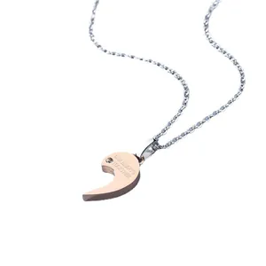 Collier demi-cœur en or rose avec gravure OUR HEARTS TOGETHER et petit diamant