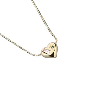 18K gouden hart ketting met roze edelsteen en groene stersteen aan bolletjesketting