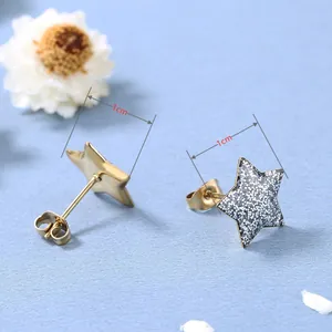 Boucles d'oreilles étoiles scintillantes avec paillettes argentées et mesure de 1 cm