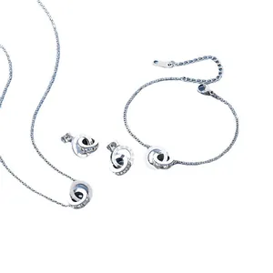 Set di gioielli in argento con doppio anello intrecciato, cristalli e numeri romani