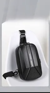 Detail of geometric hard shell bag with USB port and integrated anti-theft combination lock