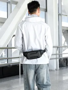 Detail showing back view of carbon fiber texture hardshell waist bag on model