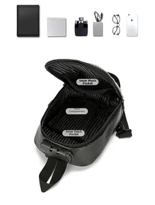 Détail intérieur du sac à bandoulière rigide montrant la grande capacité et compartiments