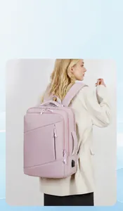 Pink business travel backpack with external USB port and minimalist side profile