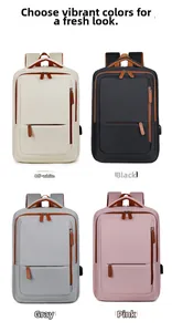 Travel backpack detail showing four available colors with integrated USB charging port
