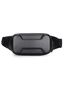 Detail of hardshell motorcycle chest bag featuring a glossy carbon fiber texture and strap