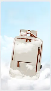 Lightweight cream travel backpack with brown details shown floating among fluffy clouds