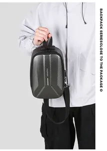 Detail of black carbon fiber hard shell sling bag featuring a secure TSA combination lock