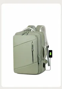 Detail of travel backpack with external USB charging port and connected smartphone