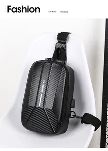 Detail of polyhedron hard shell chest bag with carbon fiber texture and USB port