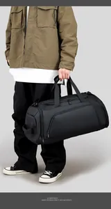 Detail of black tactical gym bag with water-resistant zippers and smart storage pockets