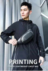 Detailed view of black hard shell chest bag with carbon fiber texture and geometric design