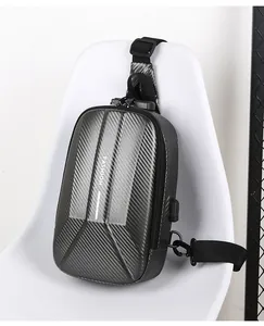 Detail of crossbody bag with USB port, anti-theft lock and carbon fiber texture