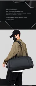 Close-up of the black sports duffle bag with multiple pockets and smart storage compartments