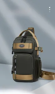 Detail view of military green oxford chest bag with waterproof zippers and mesh side pocket