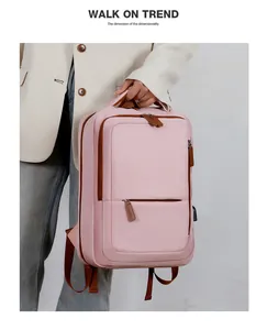 Pink travel laptop backpack featuring side USB charging port for business and daily commute