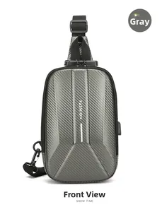Detail of grey crossbody bag showing carbon fiber texture and secure combination lock