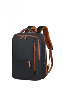 Detail of black travel backpack with USB charging port and breathable honeycomb back pad