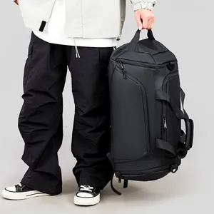 Large black sports gym bag with independent shoe compartment and waterproof nylon fabric