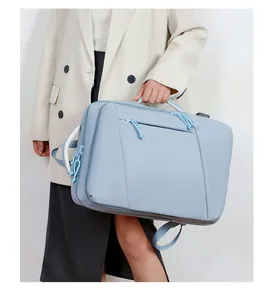 Detailed side view of the light blue travel backpack with a reinforced handle and zipper