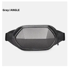 Detailed macro view of the grey hardshell bag featuring carbon fiber texture and geometric panels