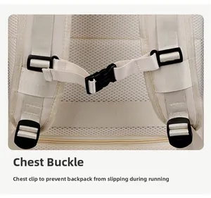 Detail of the adjustable chest buckle on a beige travel backpack with breathable mesh