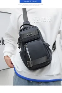 Detail view of durable multi-pocket grey sports chest bag with adjustable strap