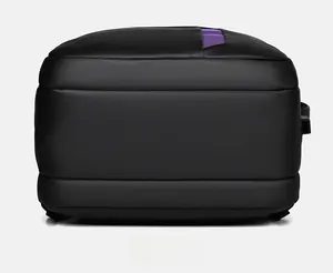 Detailed macro view of the black waterproof business backpack bottom with purple webbing